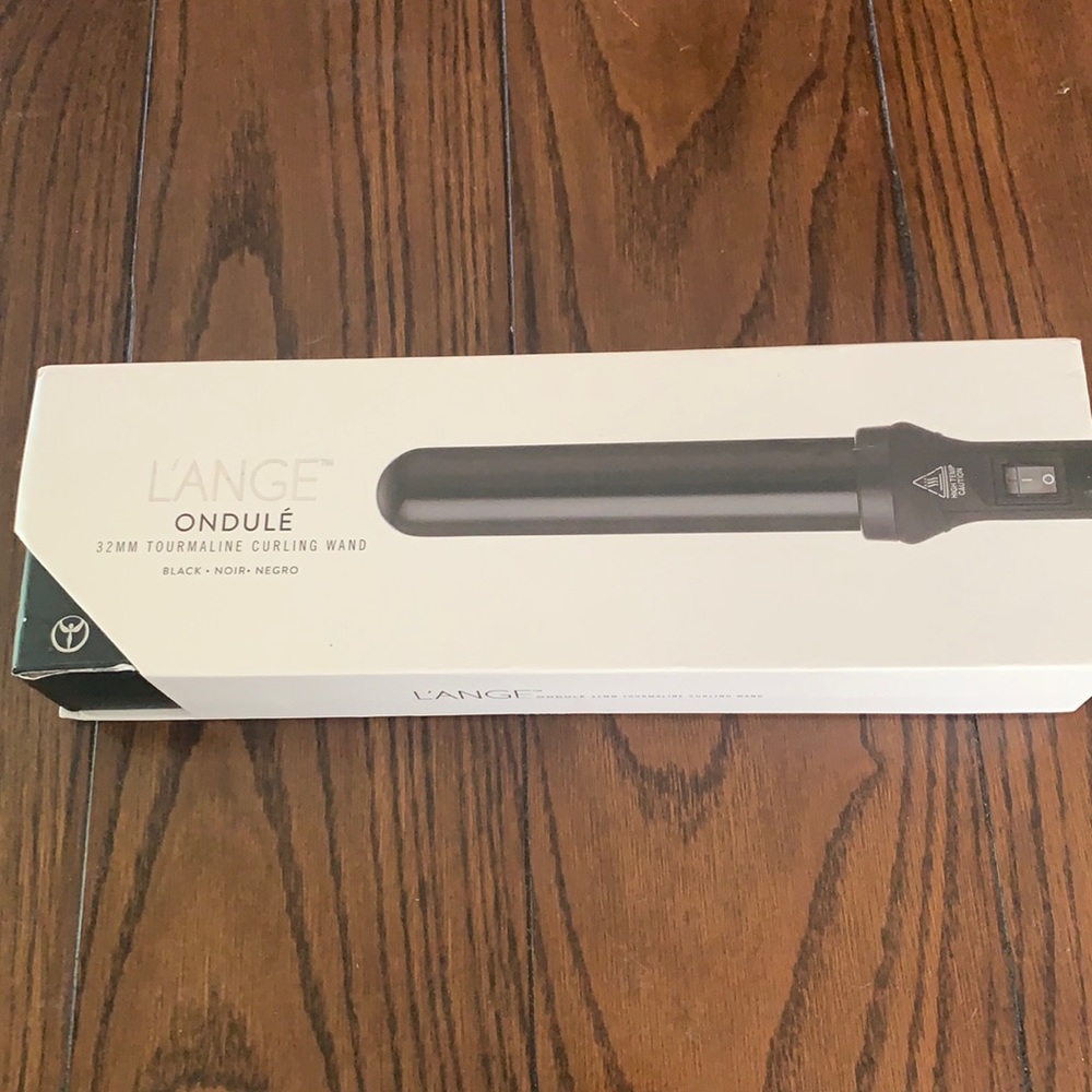 Lange curling wand, never used, in box.